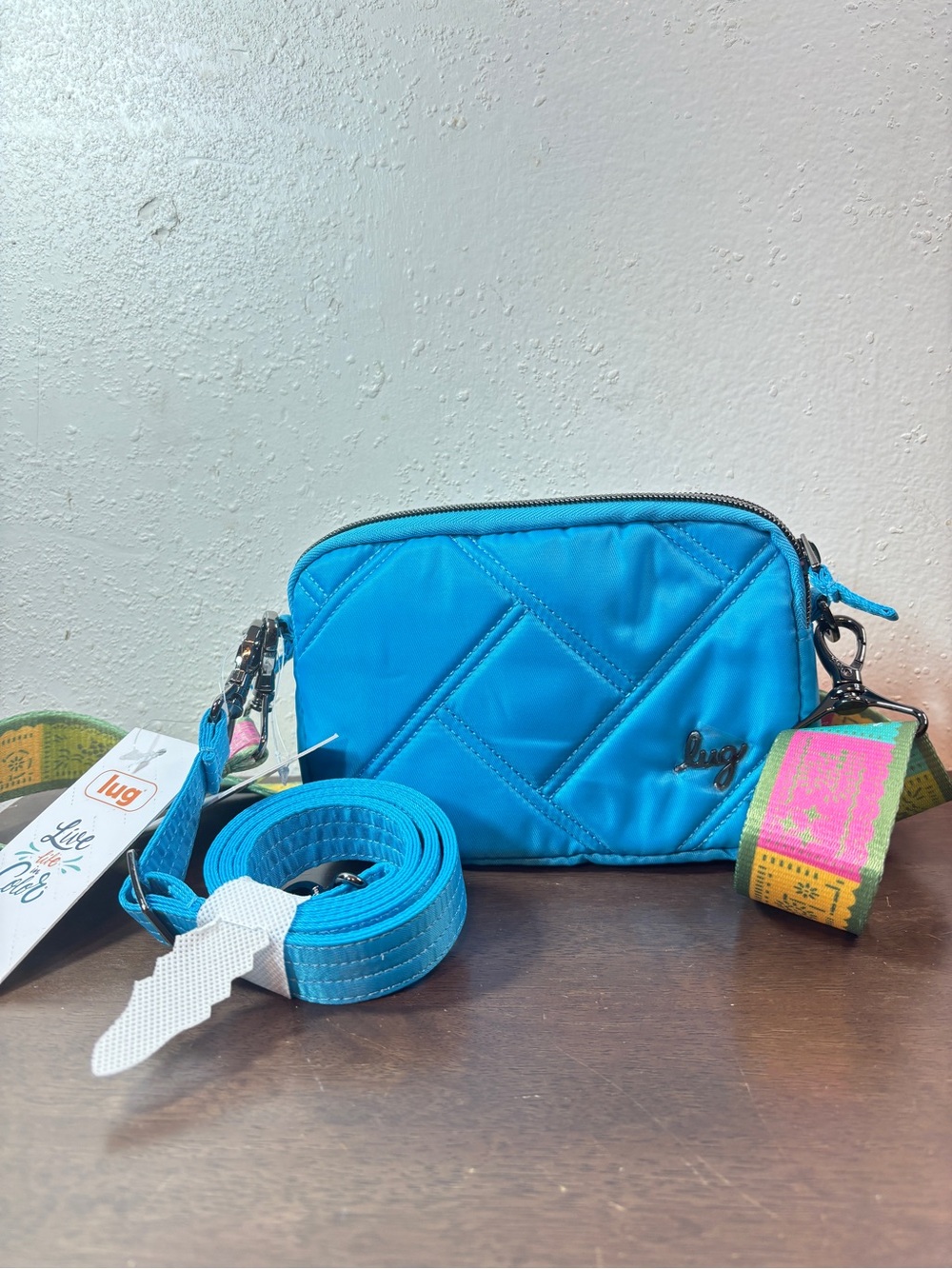lug Quilted Teal Crossbody with Multicolor Woven Strap - Picture 4 of 8